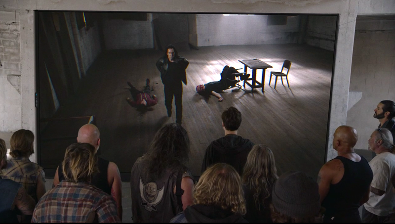 Dark Coop walks out, leaving two corpses behind. (Screenshot: Twin Peaks)
